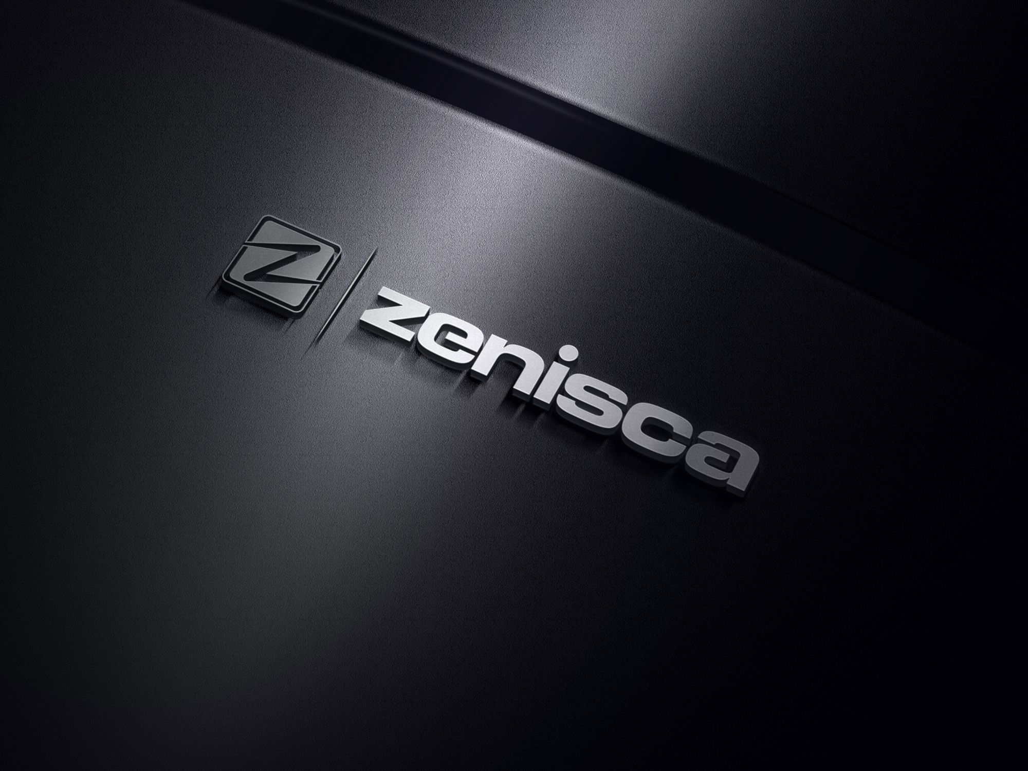 The Zenisca logo embossed in brushed metal on a dark surface.